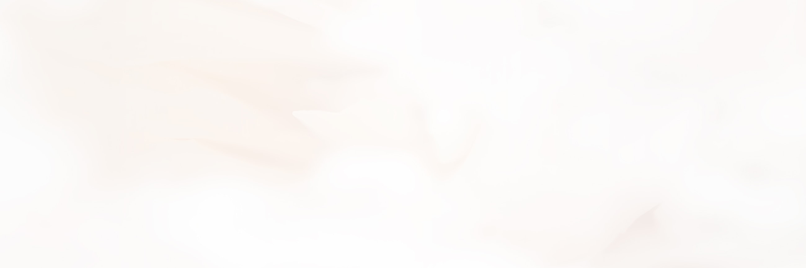 Soft, abstract light background with pale hues.