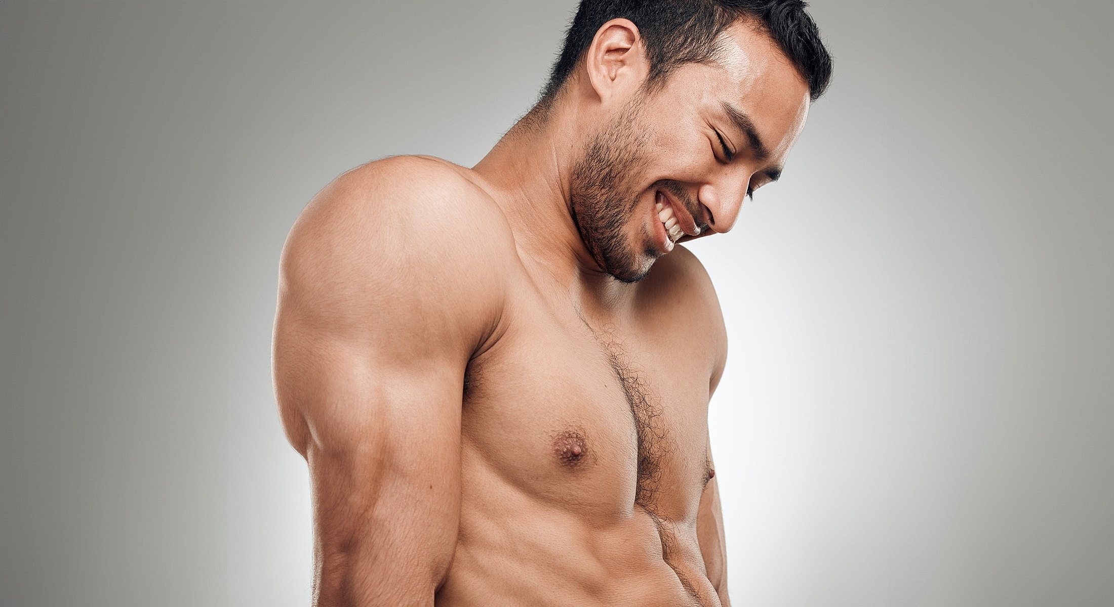 Woman in brown top with soft lighting.