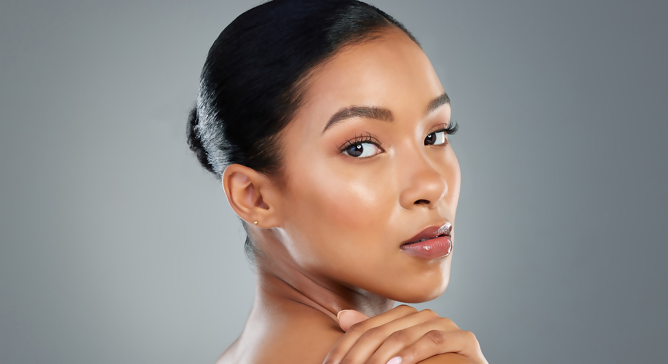 Portrait of a woman with elegant hairstyle.